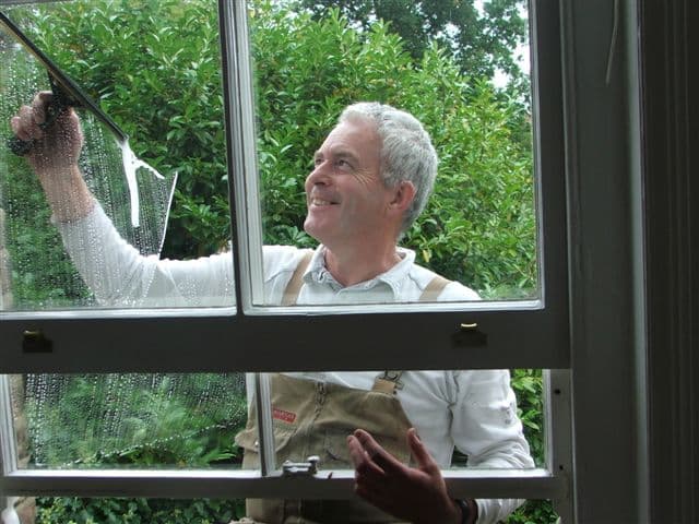 photo of kevin cleaning windows